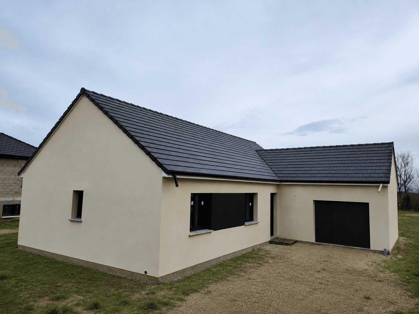 Maison en forme de L en plein pied - Photo 1